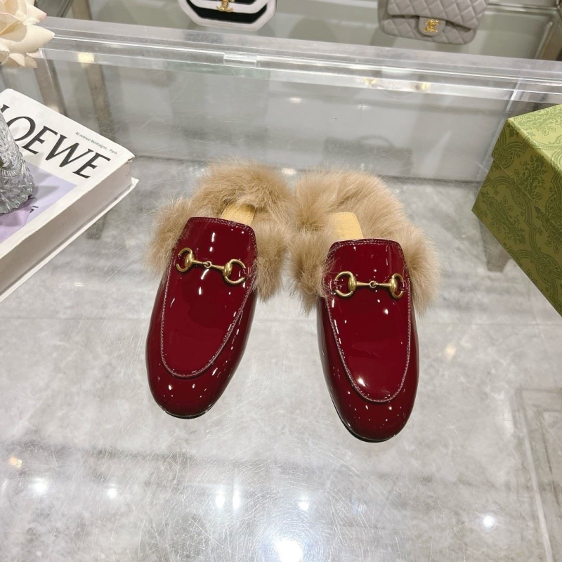 G*u*i slippers